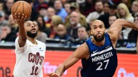 Cleveland Cavaliers guard Darius Garland (10) drives to the basket against Minnesota Timberwolves center Rudy Gobert (27) during the first half at Rocket Arena.