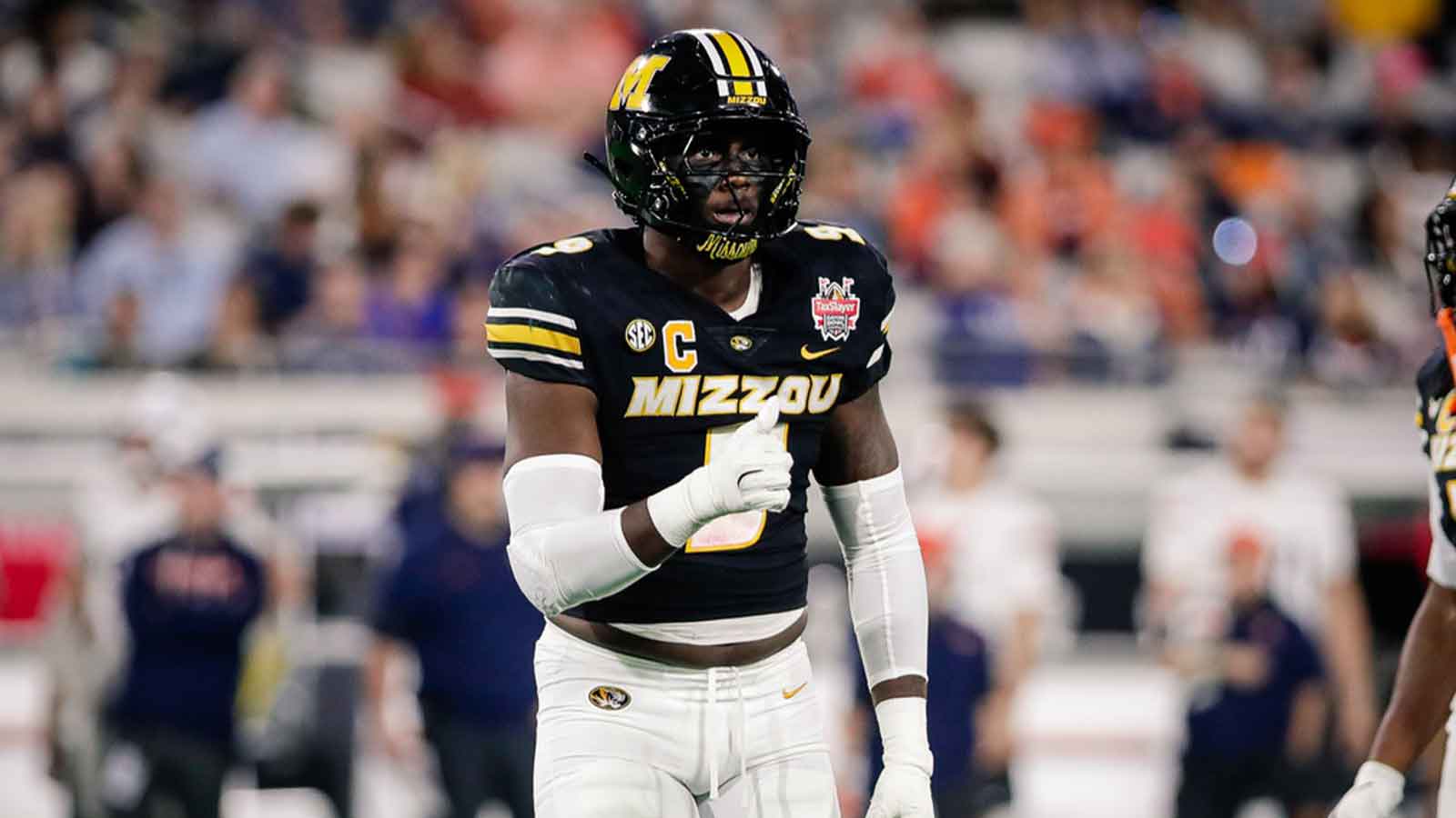 Missouri Tigers defensive end Zion Young (9) looks on before a play against the Virginia Cavaliers in the first half at EverBank Stadium.
