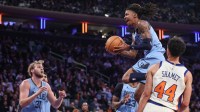 Memphis Grizzlies guard Ja Morant (12) drives past New York Knicks guard Landry Shamet (44) in the third quarter at Madison Square Garden.
