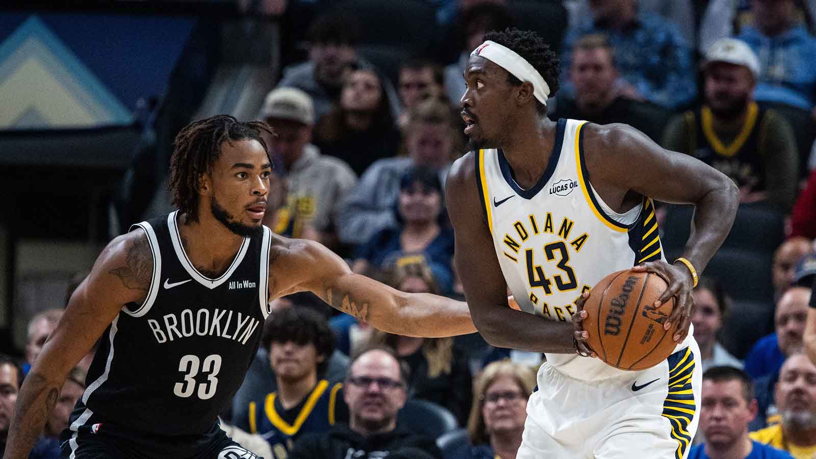 Indiana Pacers forward Pascal Siakam (43) holds the ball while Brooklyn Nets center Nic Claxton (33) defends in the second half at Gainbridge Fieldhouse.