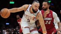 Phoenix Suns forward Dillon Brooks (3) drives to the basket against Miami Heat guard Norman Powell (24) during the fourth quarter at Kaseya Center. Mandatory Credit: Sam Navarro-Imagn Images