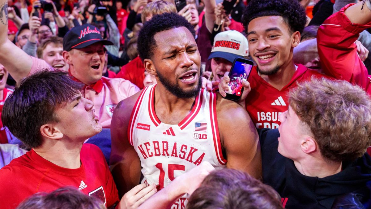 Nebraska Cornhuskers forward Jared Garcia (15) celebrates with fans after defeating the Michigan State Spartans at Pinnacle Bank Arena.