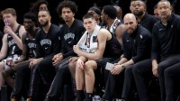 Brooklyn Nets guard Egor Demin (8) watches from the bench during double overtime against the Boston Celtics at Barclays Center.