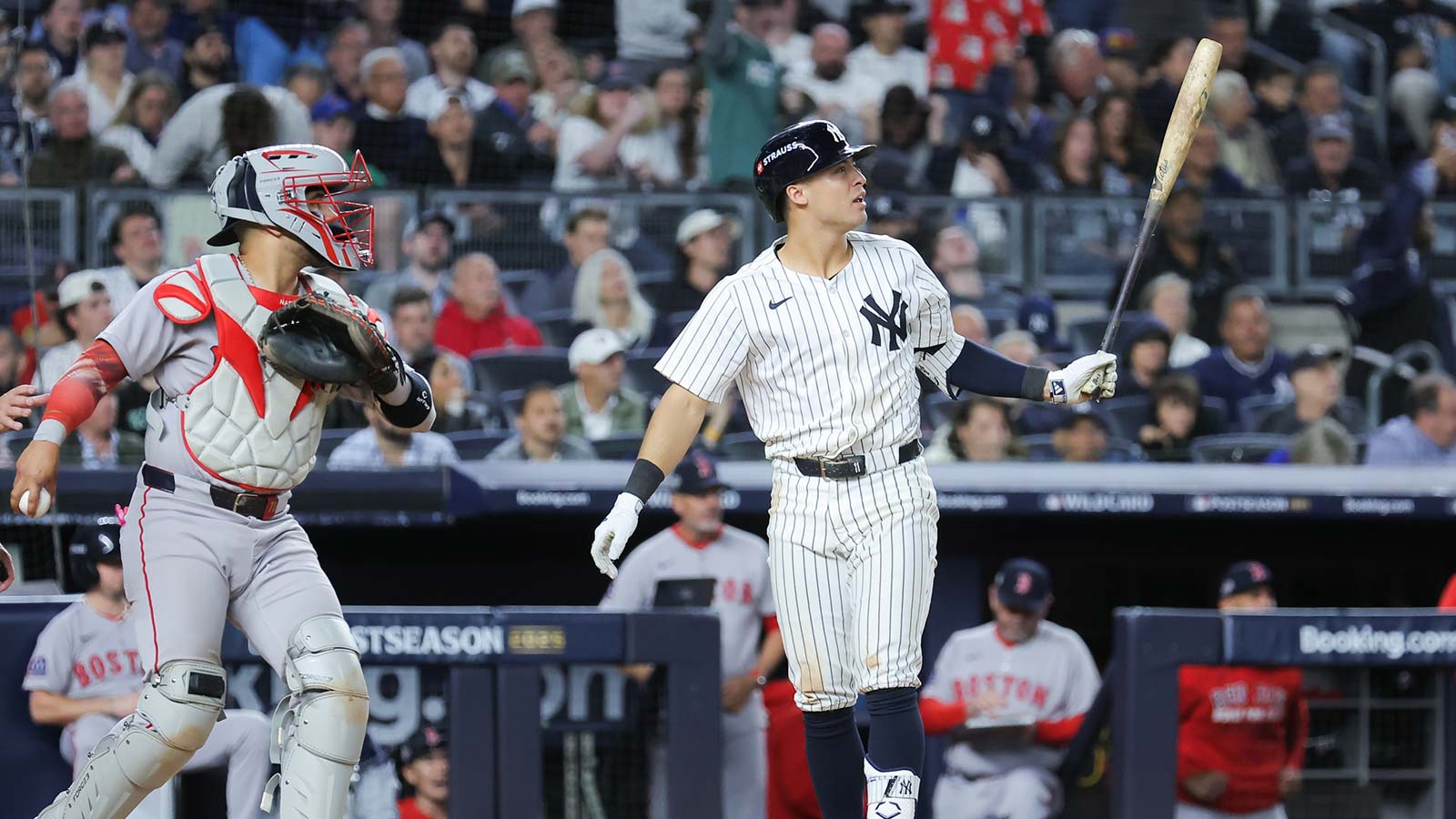 Oct 1, 2025; Bronx, New York, USA; New York Yankees shortstop Anthony Volpe (11) reacts after striking out during the sixth inning against the Boston Red Sox during game two of the Wildcard round for the 2025 MLB playoffs at Yankee Stadium. Mandatory Credit: Brad Penner-Imagn Images
