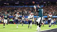 Feb 4, 2018; Minneapolis, MN, USA; Philadelphia Eagles quarterback Nick Foles (9) catches a touchdown pass against the New England Patriots in the second quarter in Super Bowl LII at U.S. Bank Stadium. Mandatory Credit: Mark J. Rebilas-Imagn Images