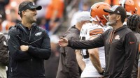 Philadelphia Eagles head coach Nick Sirianni talks with Cleveland Browns head coach Kevin Stefanski before the game at FirstEnergy Stadium.