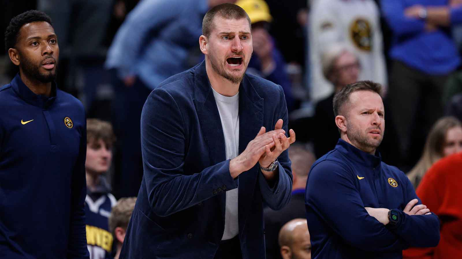 Denver Nuggets center Nikola Jokic reacts from the bench in the fourth quarter against the Milwaukee Bucks at Ball Arena.