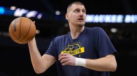 Denver Nuggets center Nikola Jokic (15) during warmups prior to the game against the Milwaukee Bucks at Fiserv Forum.