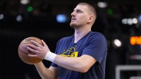 Denver Nuggets center Nikola Jokic (15) during warmups prior to the game against the Milwaukee Bucks at Fiserv Forum.
