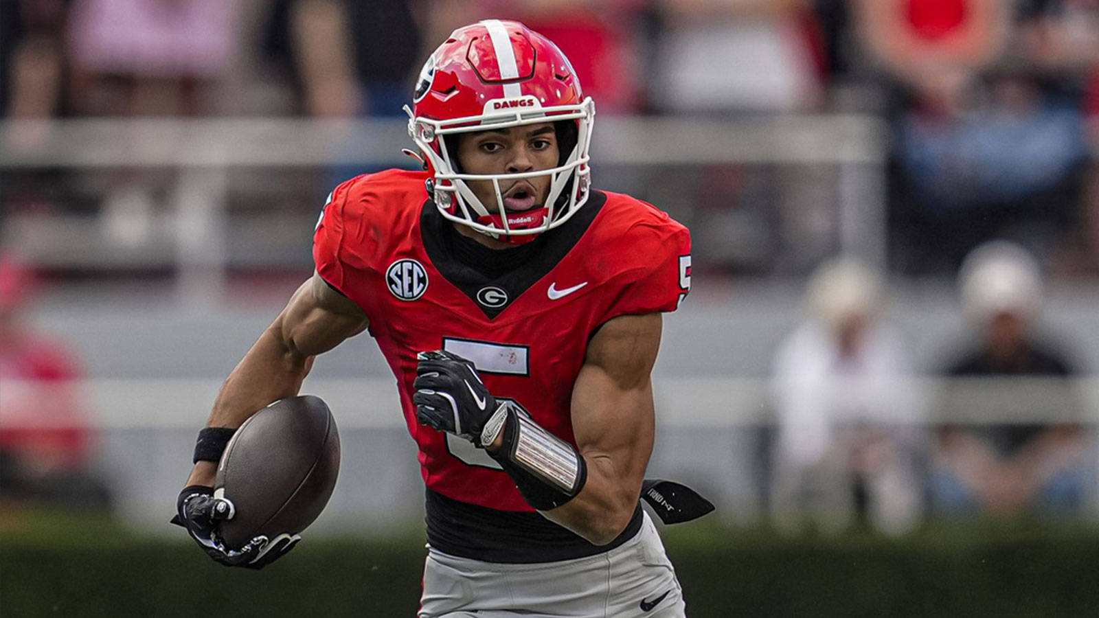 Georgia Bulldogs wide receiver Noah Thomas (5) runs after a catch against the Charlotte 49ers during the second half at Sanford Stadium. 