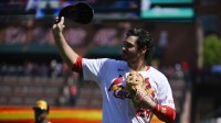 St. Louis Cardinals third baseman Nolan Arenado (28) salutes the fans after he was ceremonially removed before the start of the first inning against the Milwaukee Brewers at Busch Stadium