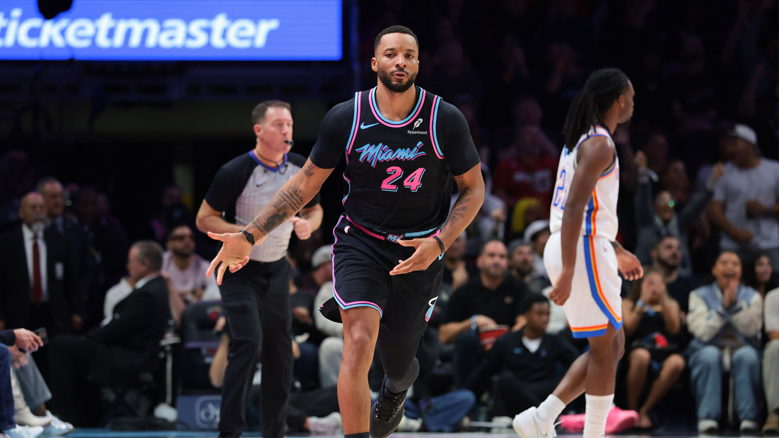  Miami Heat guard Norman Powell (24) reacts after scoring against the Oklahoma City Thunder during the second quarter at Kaseya Center.