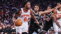 Jan 21, 2026; New York, New York, USA; New York Knicks forward Og Anunoby (8) drives past Brooklyn Nets guard Cam Thomas (24) in the second quarter at Madison Square Garden. Mandatory Credit: Wendell Cruz-Imagn Images