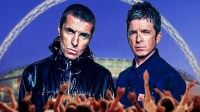 Oasis' Liam Gallagher and Noel Gallagher before their 2027 tour with Wembley Stadium background.