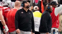 Ohio State Buckeyes head coach Ryan Day looks to the scoreboard during the Cotton Bowl at AT&T Stadium.