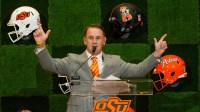Oklahoma State University (OSU) introduces the new head football coach, Eric Morris.