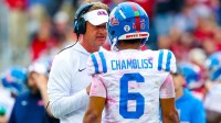 Ole Miss Rebels head coach Lane Kiffin speaks with Ole Miss Rebels quarterback Trinidad Chambliss (6) during the second half at Gaylord Family-Oklahoma Memorial Stadium.