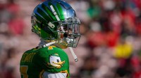 Oregon wide receiver Evan Stewart walks the field during warmups as the Oregon Ducks face the Ohio State Buckeyes Wednesday, Jan. 1, 2025, in the quarterfinal of the College Football Playoff at the Rose Bowl in Pasadena, Calif.