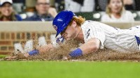 Chicago Cubs outfielder Owen Caissie (19) scores against the Milwaukee Brewers during the second inning at Wrigley Field.