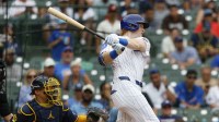 Chicago Cubs right fielder Owen Caissie (19) hits a solo home run against the Milwaukee Brewers during the sixth inning of the game one of the doubleheader at Wrigley Field.