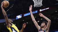 Pacers' Aaron Nesmith dunks over Thunder's Chet Holmgren