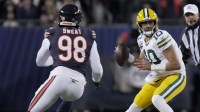 Green Bay Packers quarterback Jordan Love (10) is pressured by Chicago Bears defensive end Montez Sweat (98) during the first quarter of their game Saturday, December 20, 2025 at Soldier Field in Chicago, Illinois.