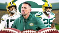 Packers HC Matt LaFleur (front, center) with Packers K Brandon McManus and Packers CB Keisean Nixon. Green Bay Packers logo in background