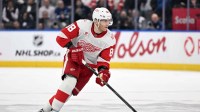 Detroit Red Wings forward Patrick Kane (88) skates with the puck against the Toronto Maple Leafs in overtime at Scotiabank Arena