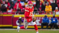 Kansas City Chiefs quarterback Patrick Mahomes (15) runs the ball during the second half against the Los Angeles Chargers at GEHA Field at Arrowhead Stadium.