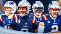 Drake Maye, Stefon Diggs, Robert Spillane, Harold Landry III all beside each other, Patriots wallpaper in the background