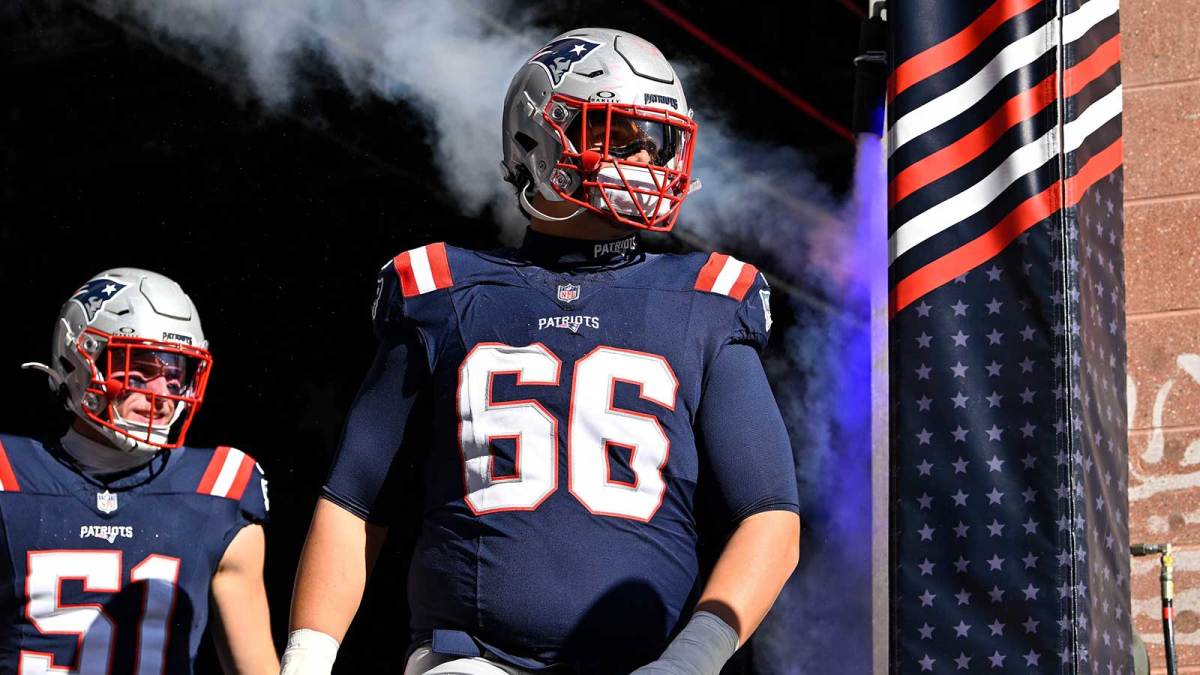 New England Patriots offensive tackle Will Campbell (66) walks out of the player's tunnel before a game against the Atlanta Falcons at Gillette Stadium.