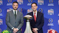 Oregon head coach Dan Lanning, left, and Indiana head coach Curt Cignetti during the head coaches’ press conference ahead of the Peach Bowl at the College Football Hall of Fame in Atlanta, Georgia, on Jan. 8, 2026.