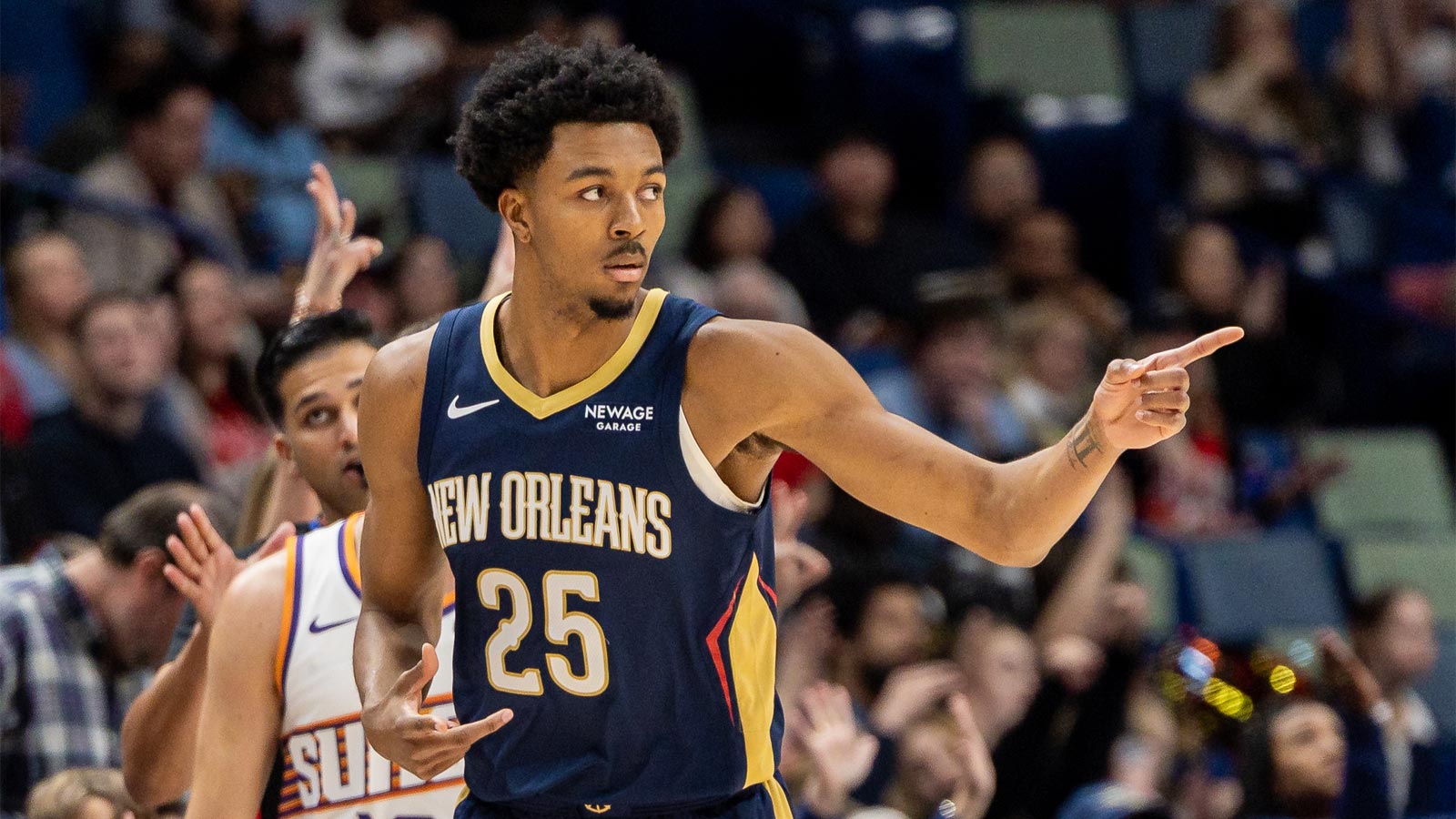 Pelicans forward Trey Murphy III (25) reacts to making a three-point basket against the Phoenix Suns during the first half at Smoothie King Center