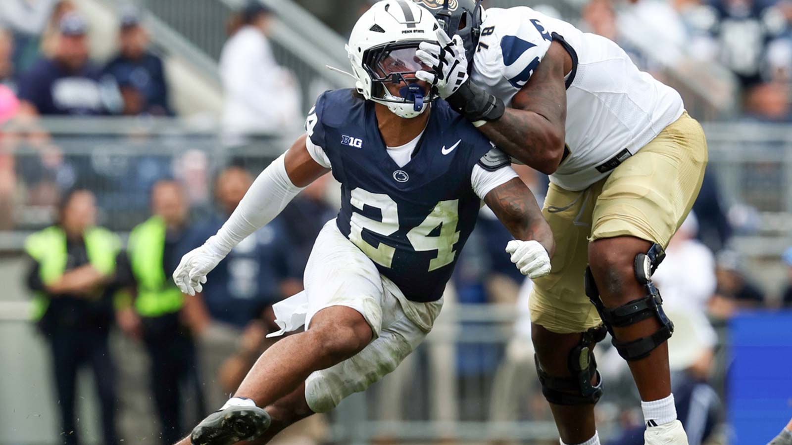Penn State Nittany Lions linebacker Amare Campbell (24) attempts to get around Florida International Panthers offensive linesman Jaleel Davis (78) during the fourth quarter at Beaver Stadium.