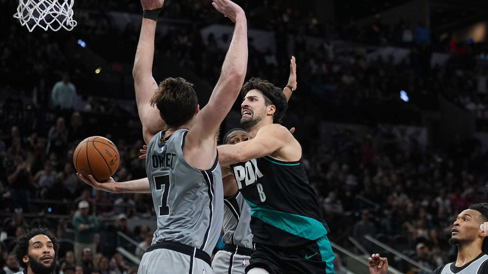 Portland Trail Blazers forward Deni Avdija (8) shoots in front of San Antonio Spurs center/forward Luke Kornet (7) in the second half at Frost Bank Center.