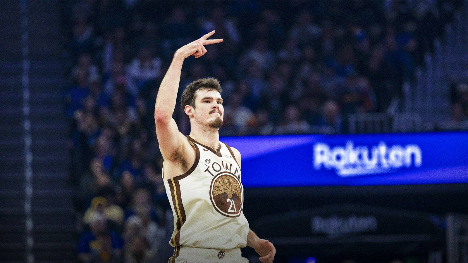 Golden State Warriors center Quinten Post (21) reacts after hitting a three-point shot against the Charlotte Hornets during the first quarter at Chase Center. 