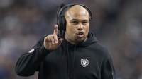 Las Vegas Raiders interim head coach Antonio Pierce signals against the New York Giants during the second quarter at Allegiant Stadium.