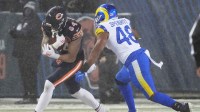 Chicago Bears tight end Colston Loveland (84) runs after the catch against Los Angeles Rams linebacker Omar Speights (48) during the second quarter of an NFC Divisional Round game at Soldier Field.