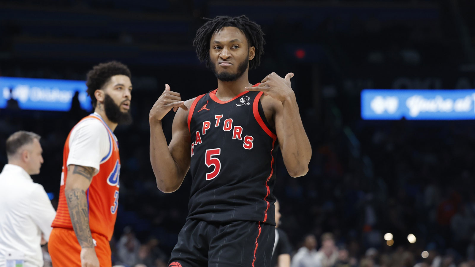 Raptors guard Immanuel Quickley (5) gestures after scoring a three point basket against the Oklahoma City Thunder during the second half at Paycom Center