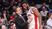 St. John's Red Storm head coach Rick Pitino greets forward Zuby Ejiofor (24) after substituting him out of the game in the second half against the Marquette Golden Eagles at Madison Square Garden