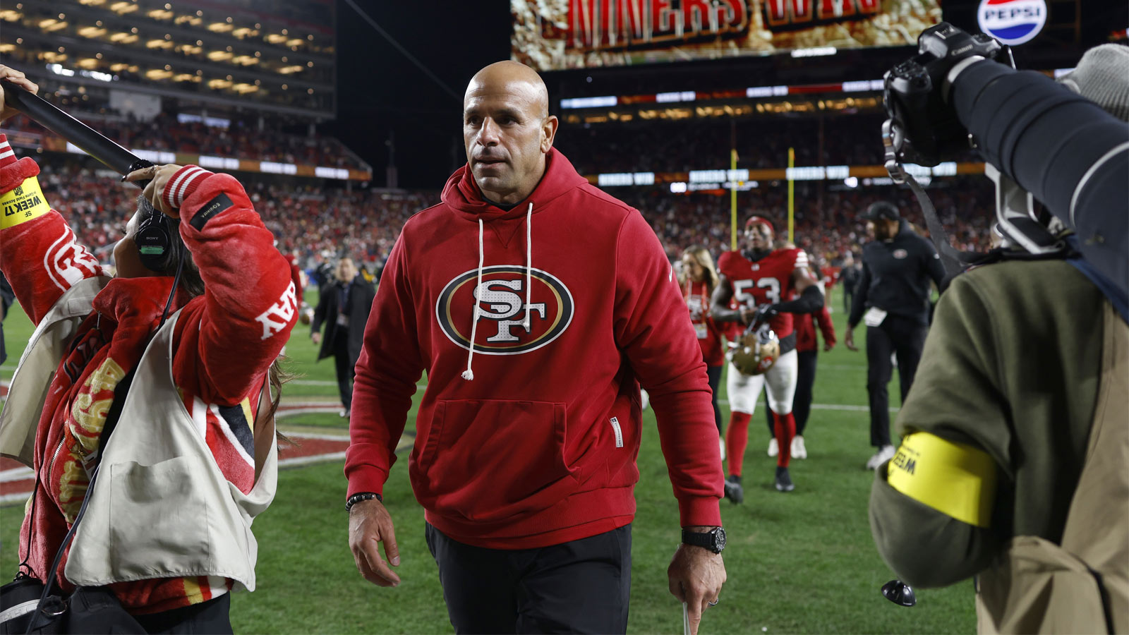 San Francisco 49ers defensive coordinator Robert Saleh leaves the field after defeating the Chicago Bears at Levi's Stadium. 