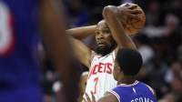 Houston Rockets forward Kevin Durant (7) and Philadelphia 76ers guard Vj Edgecombe (77) during the fourth quarter at Xfinity Mobile Arena