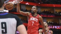 Rockets forward Kevin Durant (7) dunks the ball