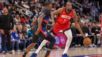 Detroit Pistons guard Javonte Green (31) defends against Houston Rockets forward Kevin Durant (7) during the first half at Little Caesars Arena.