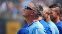 Kansas City Royals manager Matt Quatraro (33) stands on field against the Toronto Blue Jays during the national anthem prior to a game at Kauffman Stadium.