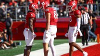 Rutgers Scarlet Knights running back Kyle Monangai (5) celebrates after a rushing touchdown with teammates during the second half against the UCLA Bruins at SHI Stadium.