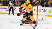 Nashville Predators center Ryan O'Reilly (90) skates with the puck against the Washington Capitals during the third period at Bridgestone Arena.
