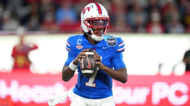 Kevin Jennings leads SMU football to a Holiday Bowl win over Arizona football as the Mustangs celebrate and their QB praises his teammates.