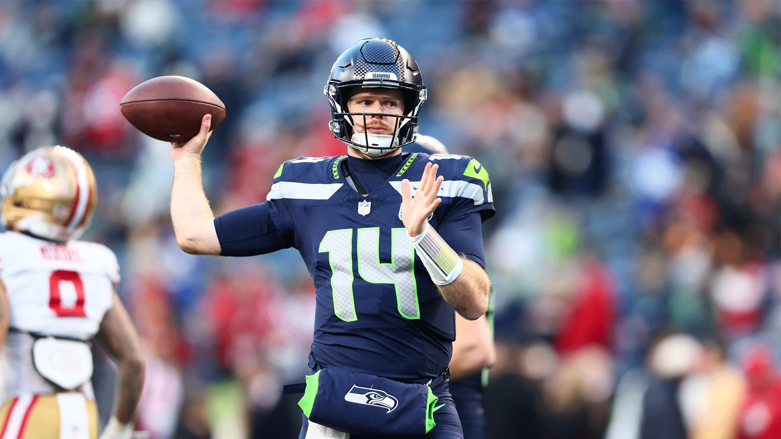 Seattle Seahawks quarterback Sam Darnold (14) warms up prior to a game against the San Francisco 49ers in an NFC Divisional Round game at Lumen Field. 