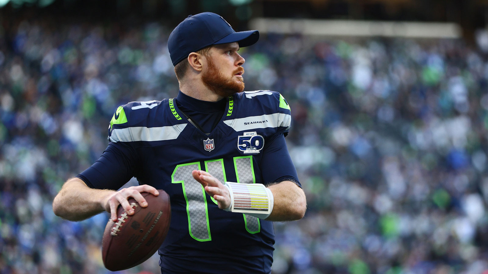 Seattle Seahawks quarterback Sam Darnold (14) passes against the Los Angeles Rams during the first half in the 2026 NFC Championship Game at Lumen Field.